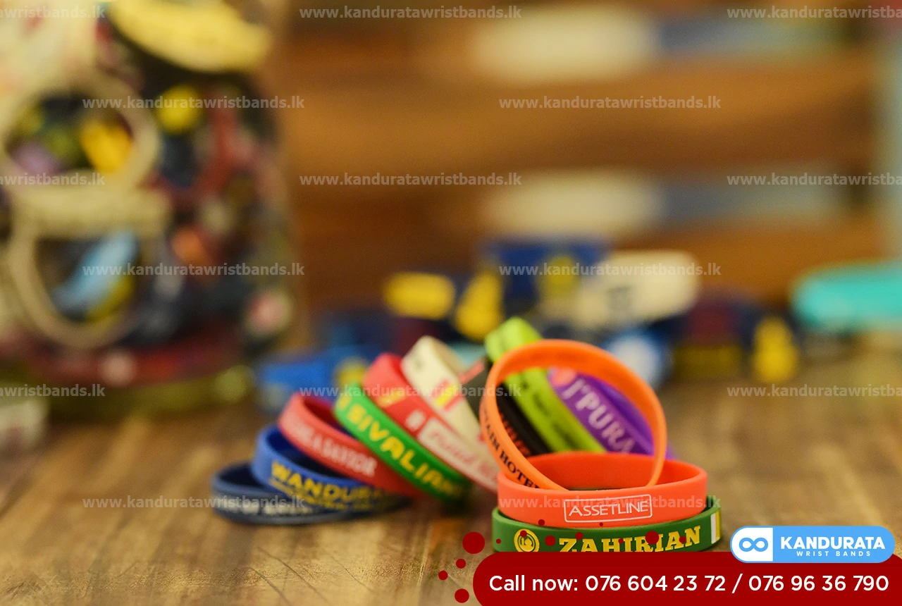 Debossed & Ink Filled Wristbands for assetline finance .engraved logo into the wristband/bracelets and fill the inks.